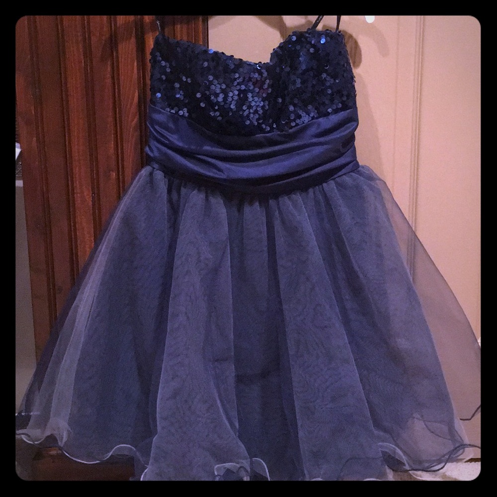 Women’s strapless, sequined dress